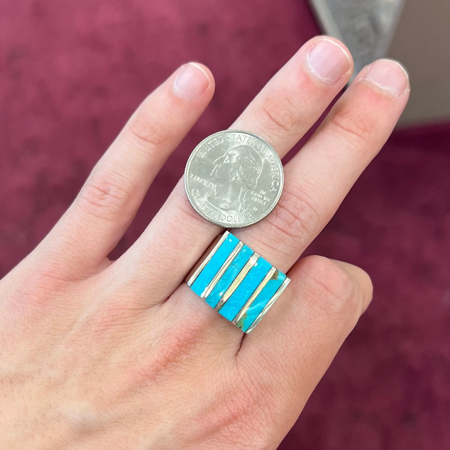 A men's turquoise ring inlay set with four turquoise stones.