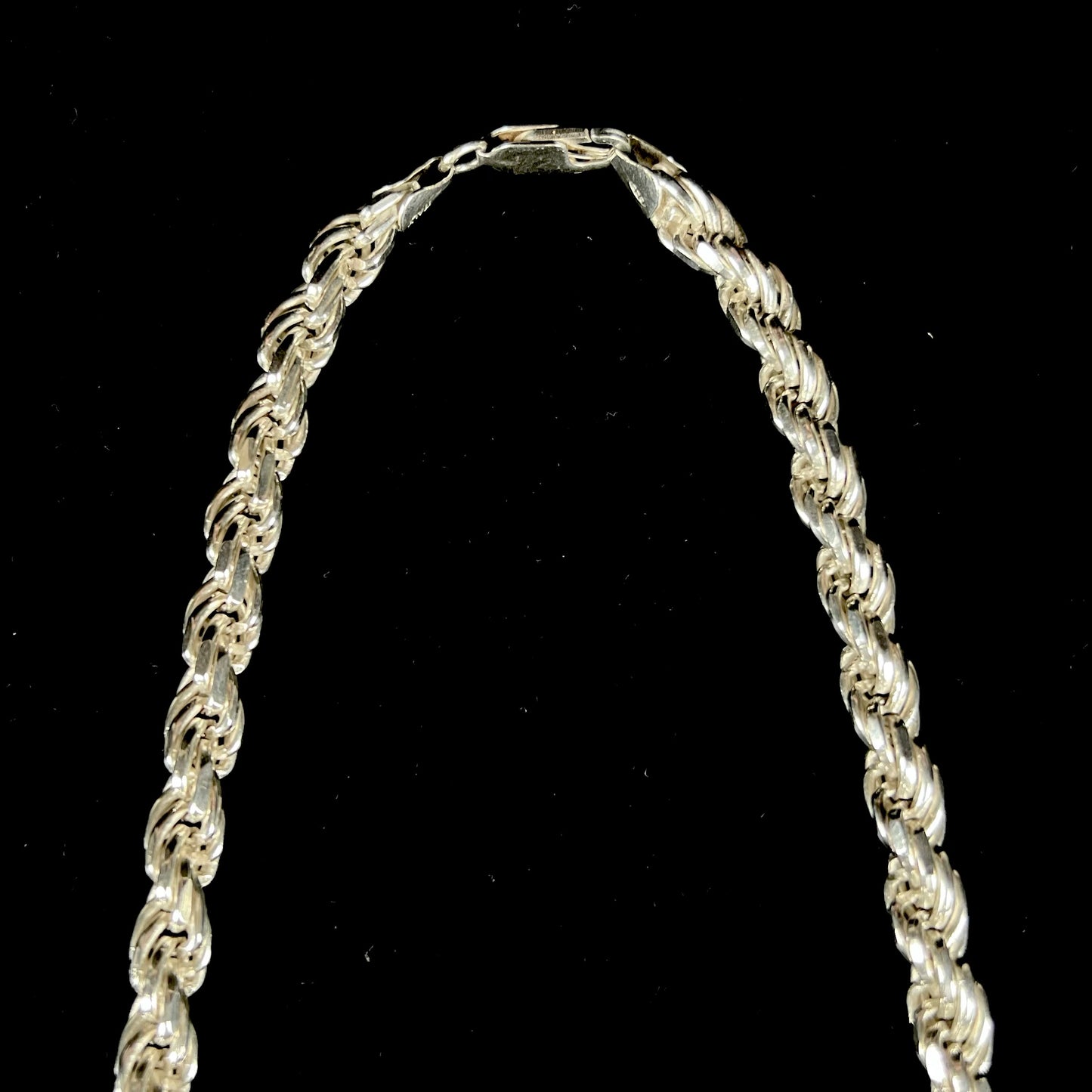 A men's 26 inch sterling silver rope chain.  The chain is stamped "925 ITALY."