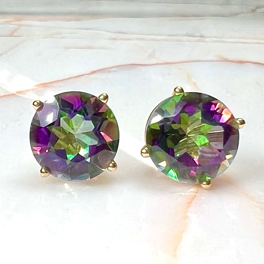 Round cut mystic topaz stones set in yellow gold prong-set push-back earrings.