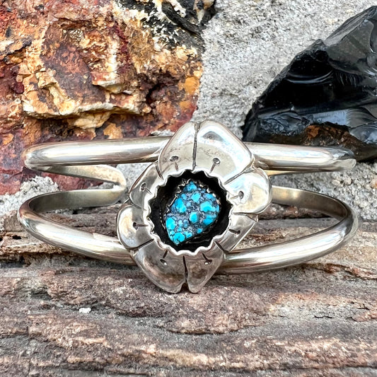 A Navajo style rough turquoise nugget silver cuff bracelet.