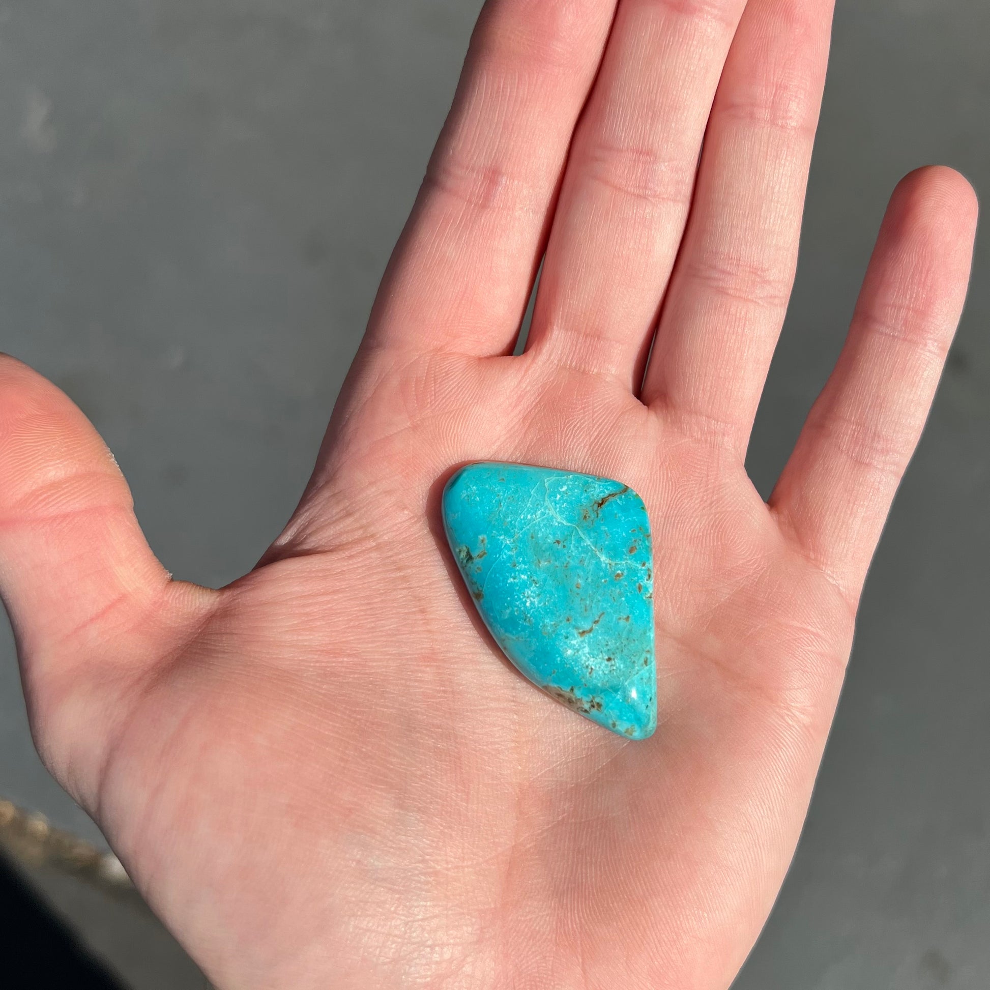 One loose blue turquoise stone from Pilot Mountain, Nevada.