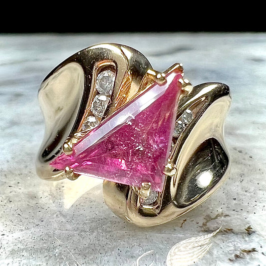 An estate yellow gold and diamond triangle cut Pala pink tourmaline ladies' ring.