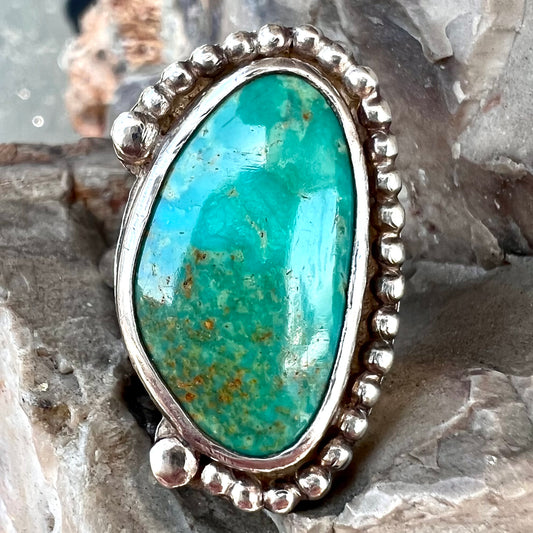 A sterling silver, Native American style green turquoise ring.  The turquoise is from the Royston Mining District.