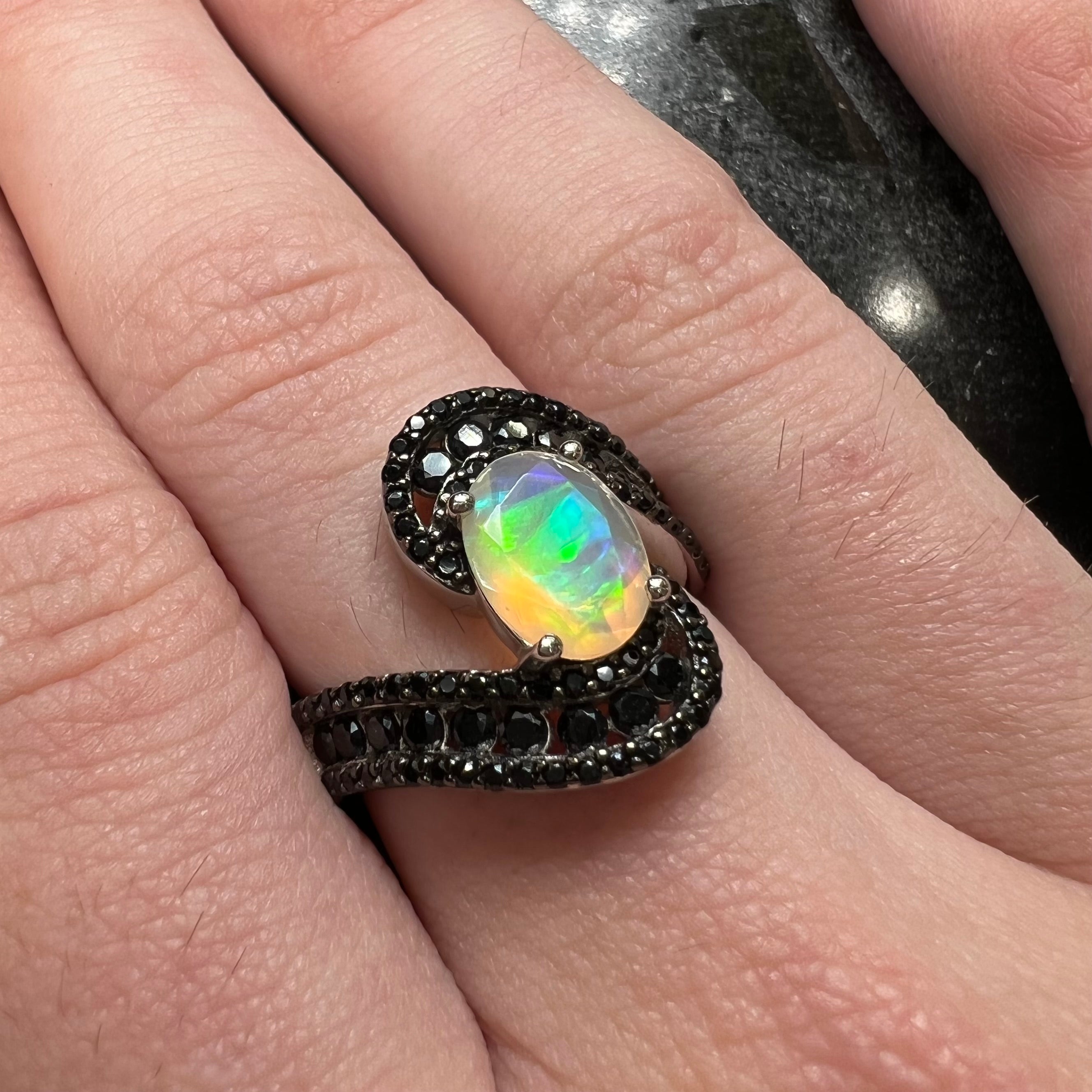 Faceted black store opal