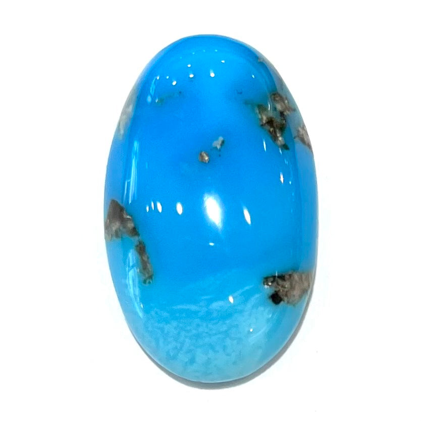 A bright blue Sleeping Beauty turquoise cabochon.