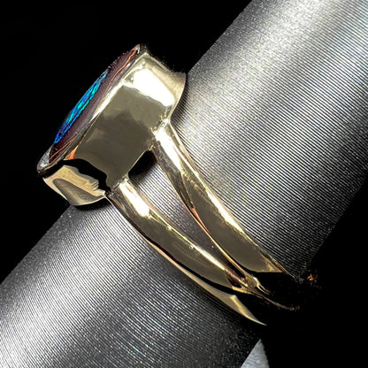 A natural Yowah Nut boulder opal split shank ring in 14kt yellow gold.